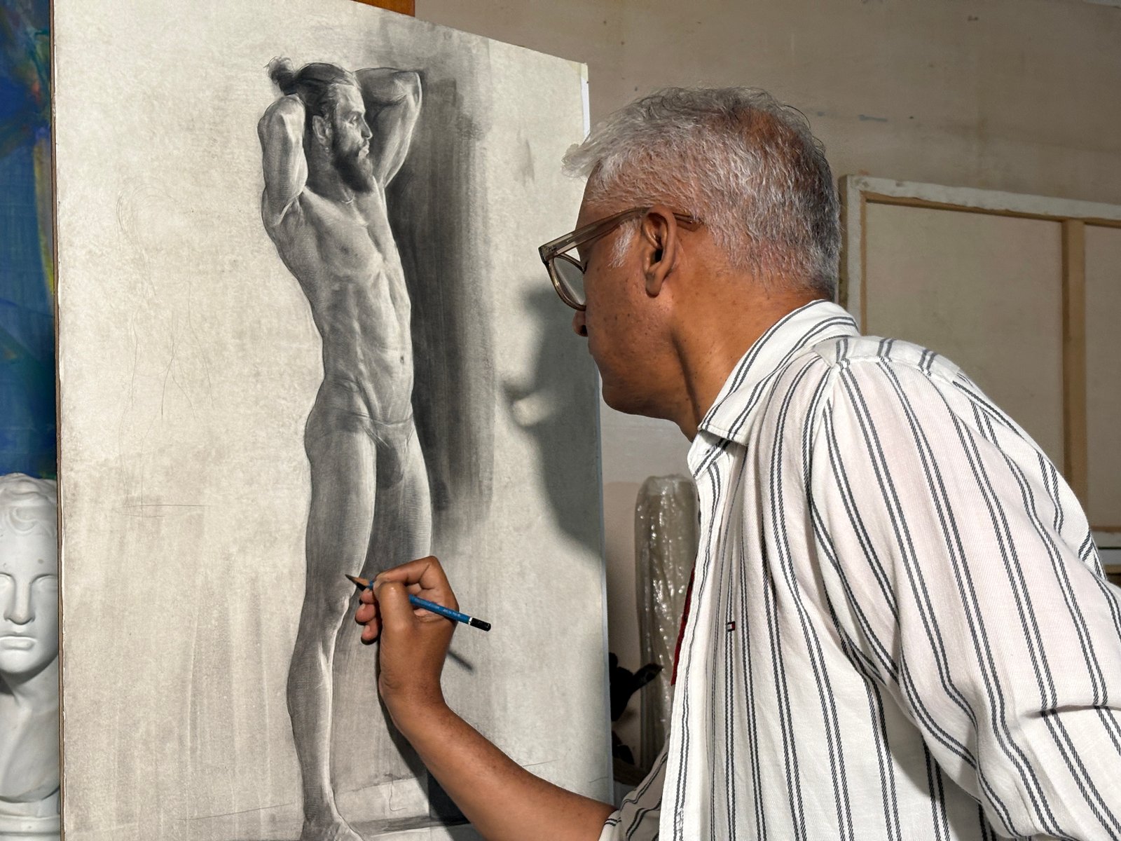 Artist sketching a figure